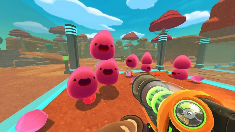 Uma captura de tela do Slime Rancher, mostrando alguns slimes pulando.