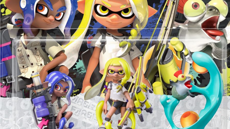 Os três novos amiibo de Splatoon para Splatoon 3: um insinuante de cabelo amarelo com um arco, um octoling de cabelo azul e o amiguinho do modo single player.