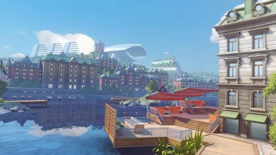 Um mapa de Overwatch 2 mostrando uma cena mostrando uma baía em Gotemburgo, com arquitetura escandinava e caminhos de tijolos.