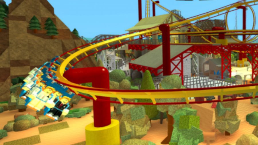 Personagens do Roblox curtindo uma montanha-russa no Theme Park Tycoon 2