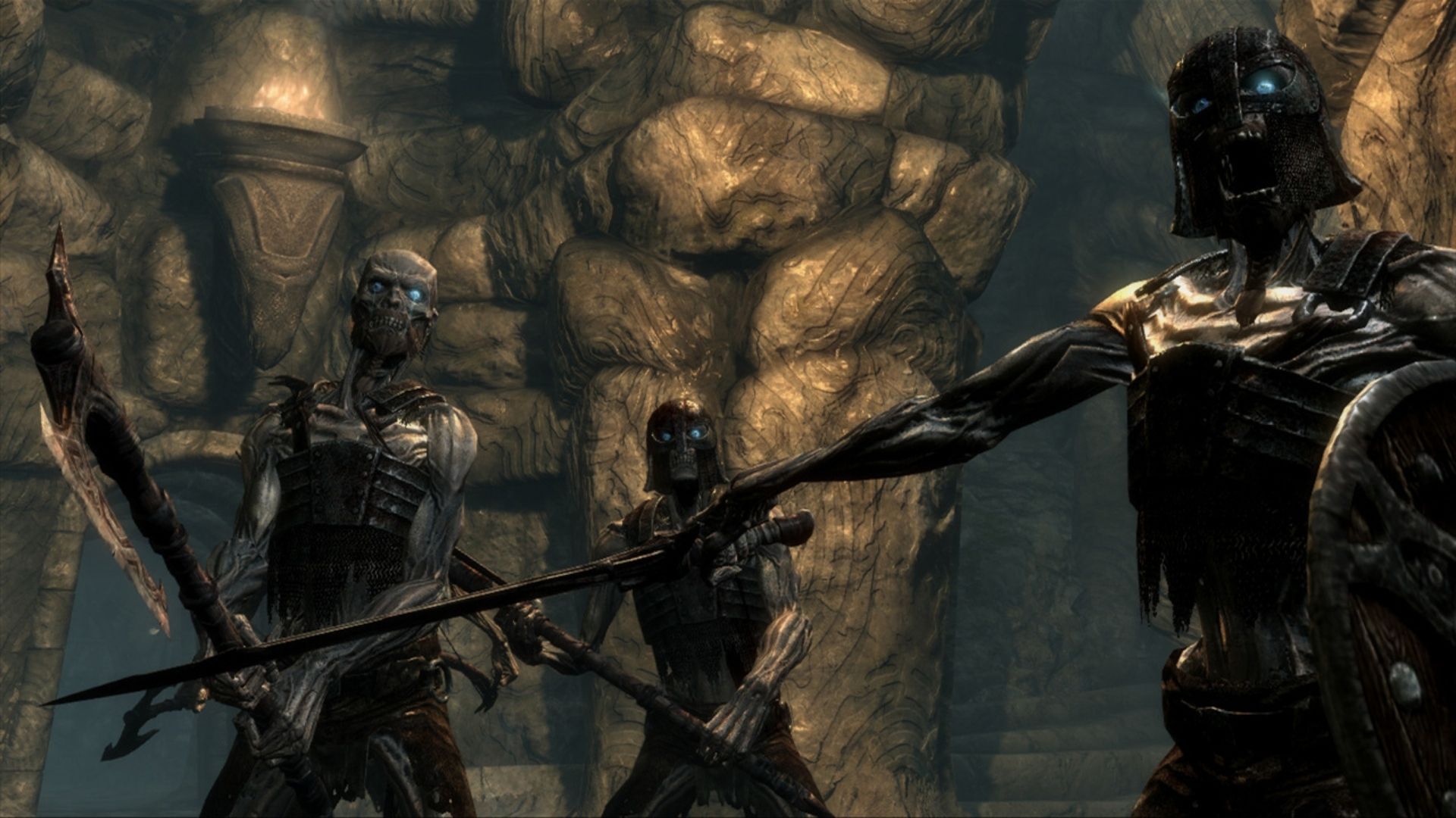 Esqueletos adornados em armaduras e empunhando armas do jogo Skyrim.