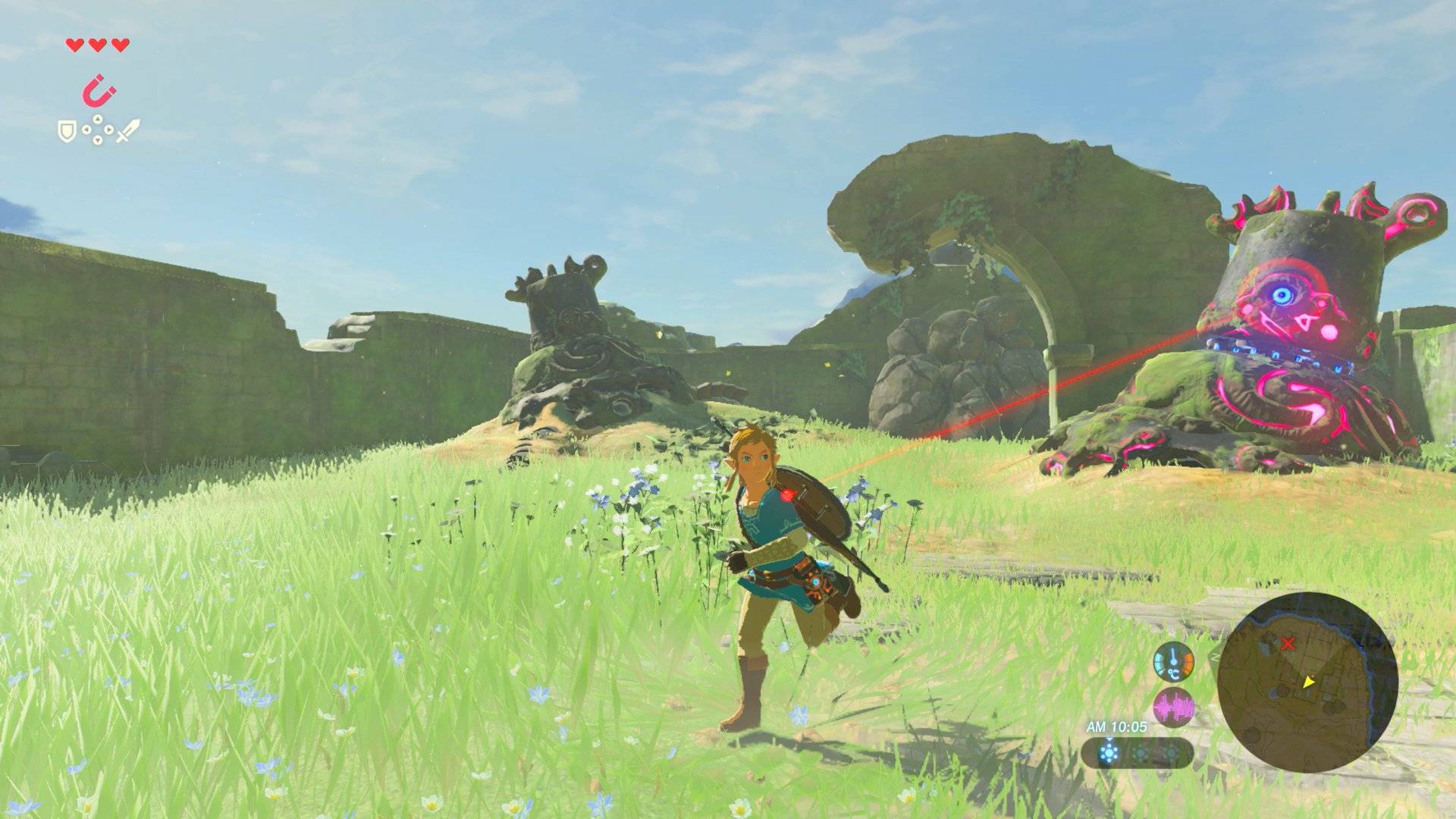 Link runs away from a guardian readying their laser 